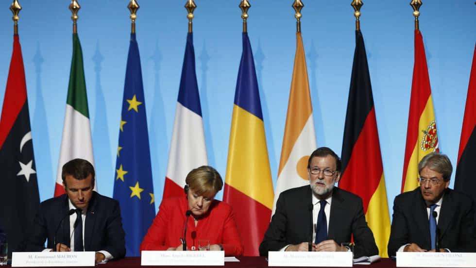 Лидерите на Франция, Германия, Испания и Италия по време на срещата в Париж за миграцията. Снимка: EFE