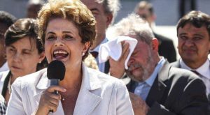 Целта на десния завой в Бразилия е не само отстраняването на Дилма Русеф, а дискредитирането на целия бразилски социален модел чрез удар по олицетворяващия го Лула (на заден план)